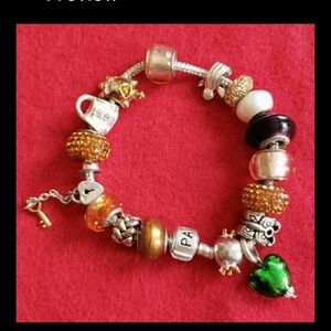 Pandora Sertling Silver Bracelet, with NON pandora Charms. 7.5"